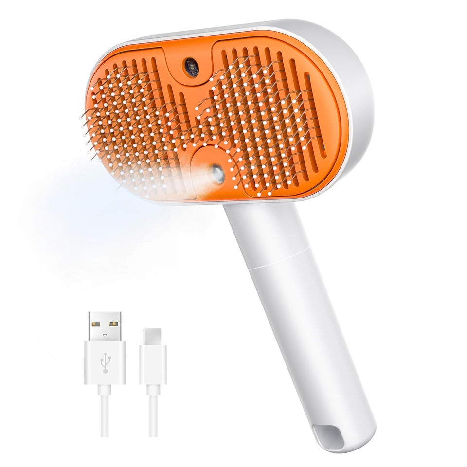 Mr.Steamy white and orange misting pet brush with charging cable